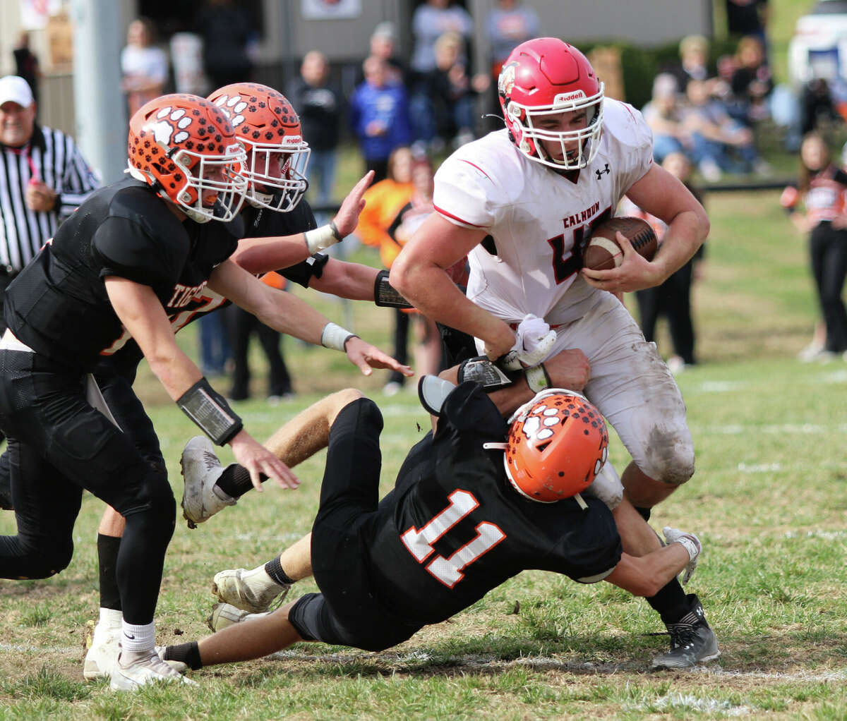 Greenfield gets physical, pounds Calhoun, 38-7