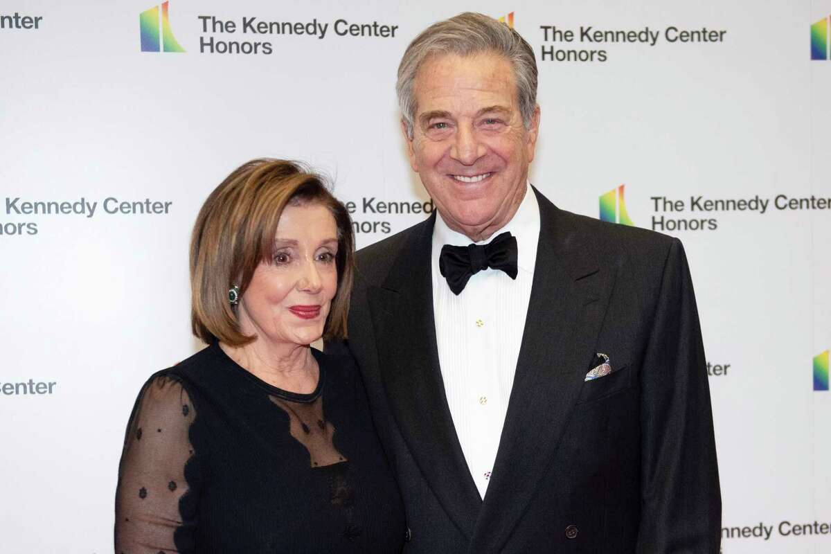 FILE - Speaker of the House Nancy Pelosi, D-Calif., and her husband, Paul Pelosi, arrive at the Kennedy Center Honors' State Department dinner on Dec. 7, 2019, in Washington. 