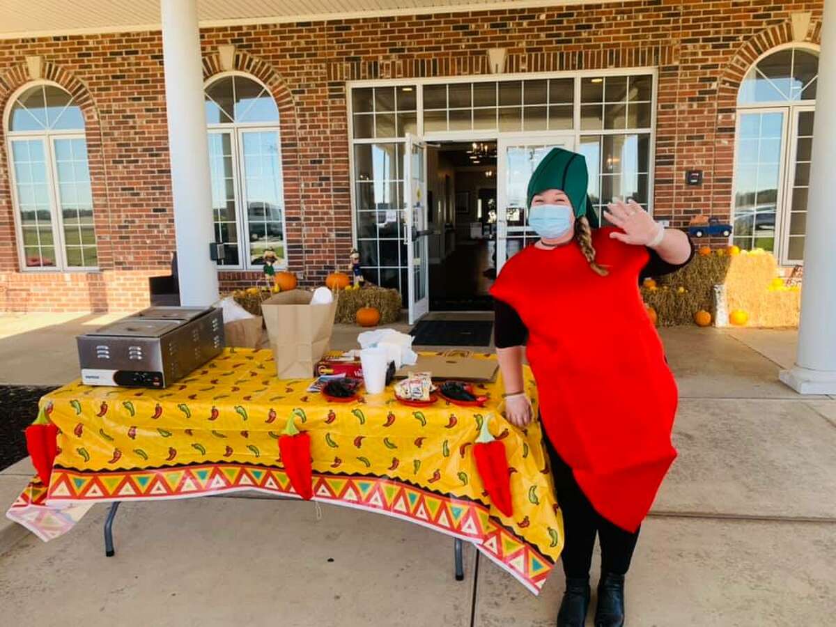 Cedarhurst Senior Living Godfrey's dietary aide, who is dressed as a chili pepper, stands by to greet visitors at the Godfrey community's Election Day Chili Drive-Thru in 2020. The senior community will hold another Chili Drive-Thru open for the public and residents on this year's Election Day, Tuesday, Nov. 8.