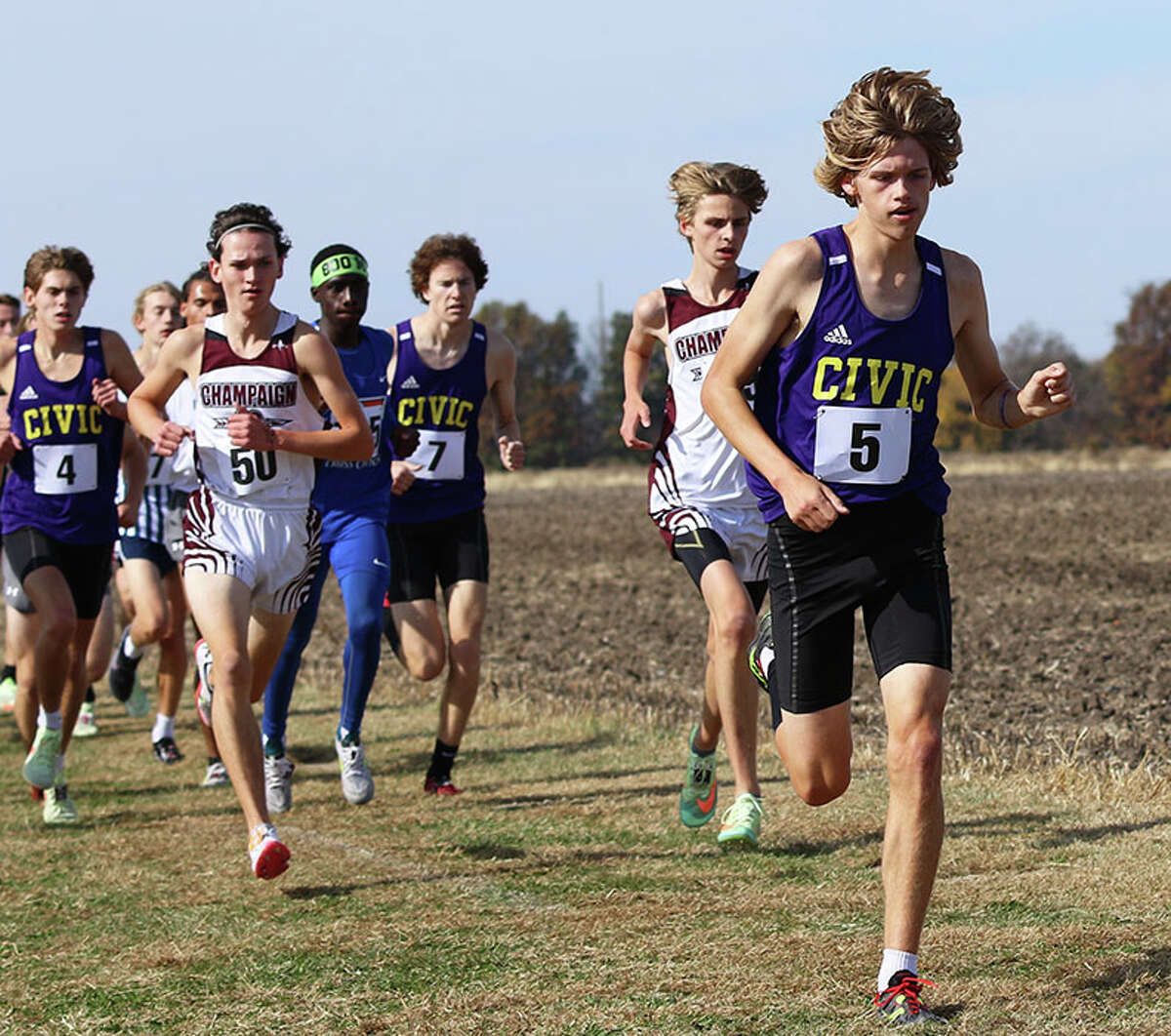 CM's Justice Eldridge (right) leads a group of runners that include Eagles teammates Lucas Naugle and D.J. Dutton on Saturday early in the race at the Glenwood Class 2A Sectional in Chatham.