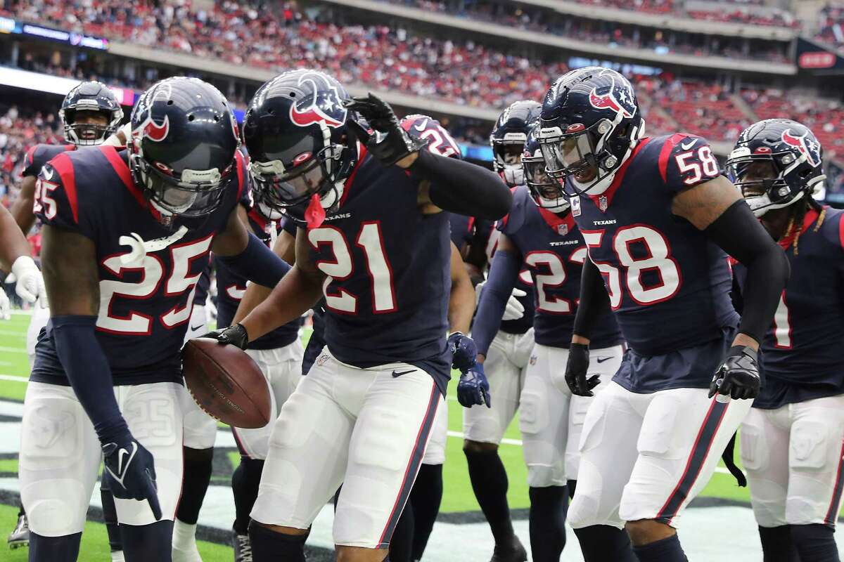Houston Texans cornerback Steven Nelson (21) celebrates his interception against Tennessee Titans in the first half of game action at NRG Stadium on Sunday, Oct. 30, 2022 in Houston.
