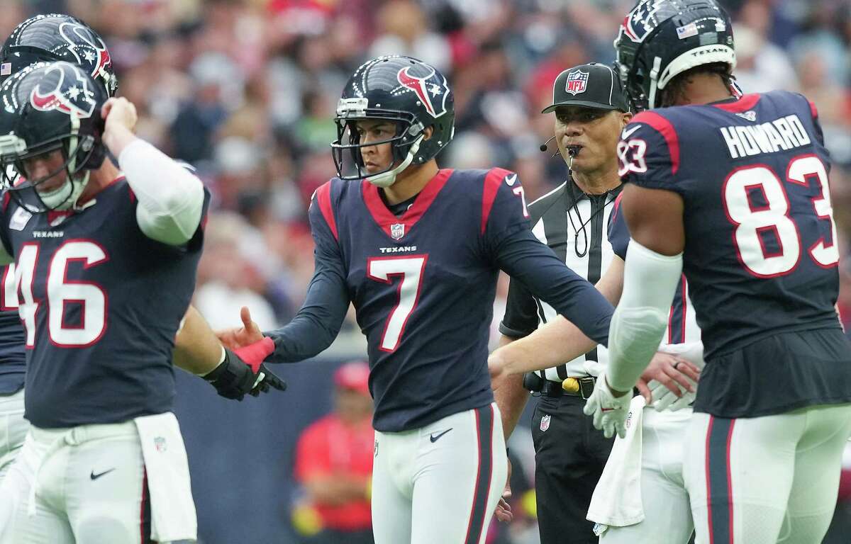 Houston Texans place kicker Ka'imi Fairbairn (7) is congratulated after making a field goal putting the Texans on the lead over the Tennessee Titans at NRG Stadium on Sunday, Oct. 30, 2022 in Houston.