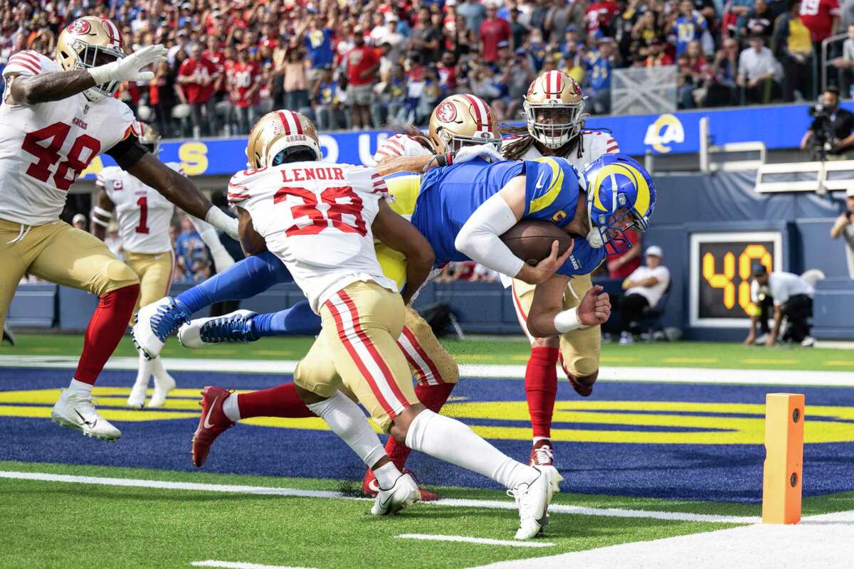 Los Angeles Rams quarterback Matthew Stafford (9) dives for a touchdown during an NFL football game against the San Francisco 49ers, Sunday, Oct. 30, 2022, in Inglewood, Calif. (AP Photo/Kyusung Gong)
