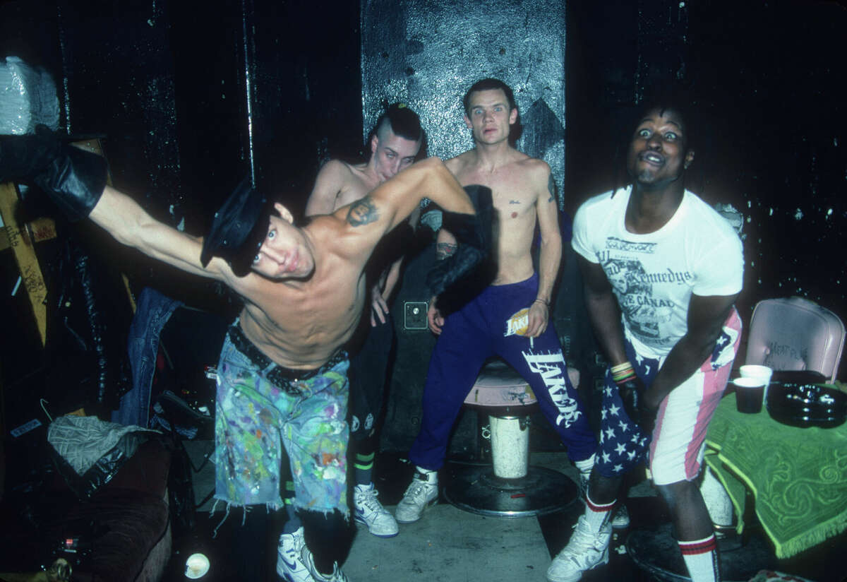 The Red Hot Chili Peppers (L-R) Anthony Kiedis, John Frusciante, Michael "Flea" Balzary, D.H. Peligro airs  for a representation    backstage astatine  First Avenue nightclub successful  Minneapolis, Minn. connected  Nov. 16, 1988. 