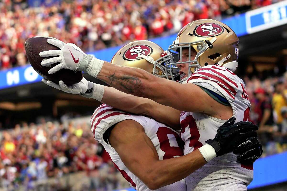 San Francisco 49ers running back Christian McCaffrey, right, celebrates his touchdown with wide receiver Willie Snead IV during the second half of an NFL football game against the Los Angeles Rams Sunday, Oct. 30, 2022, in Inglewood, Calif. (AP Photo/Ashley Landis)