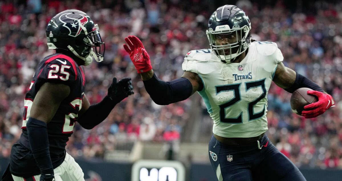 Derrick Henry, fending off Desmond King earlier this season, will once again be focus of Texans' defense.