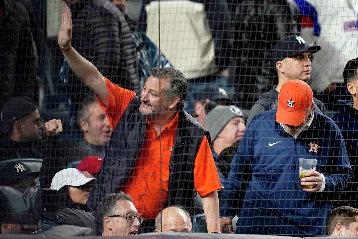 Sen. Ted Cruz, waves to spectators — wait, those are hecklers booing him — during Game 4 of the American League Championship series between the New York Yankees and the Houston Astros. A reader echoes those boos back home