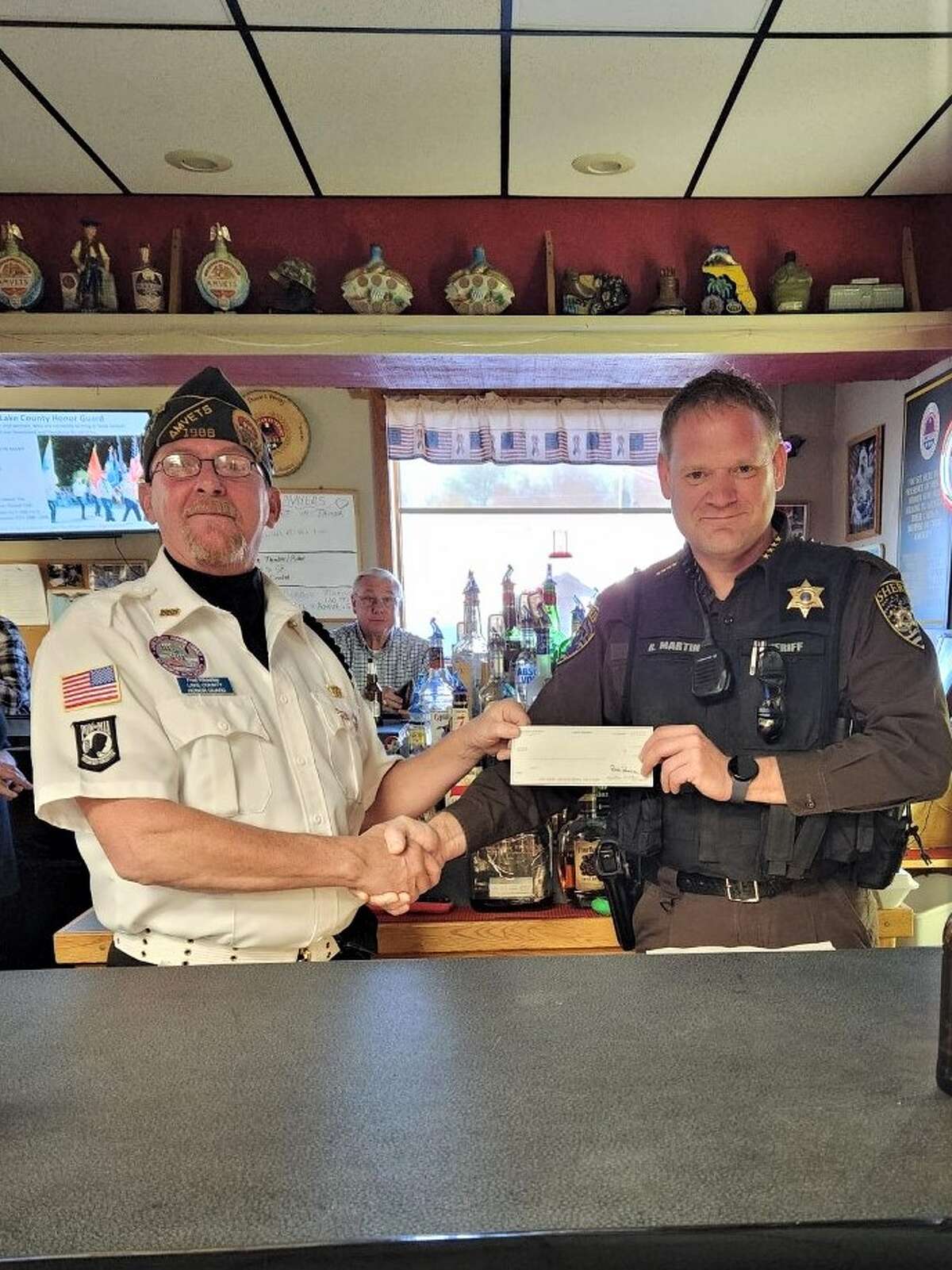 Lake County Sheriff Rich Martin presented the Baldwin AMVETS Post 1988 with a check for $500, part of the ongoing charitable campaign supporting local nonprofits.