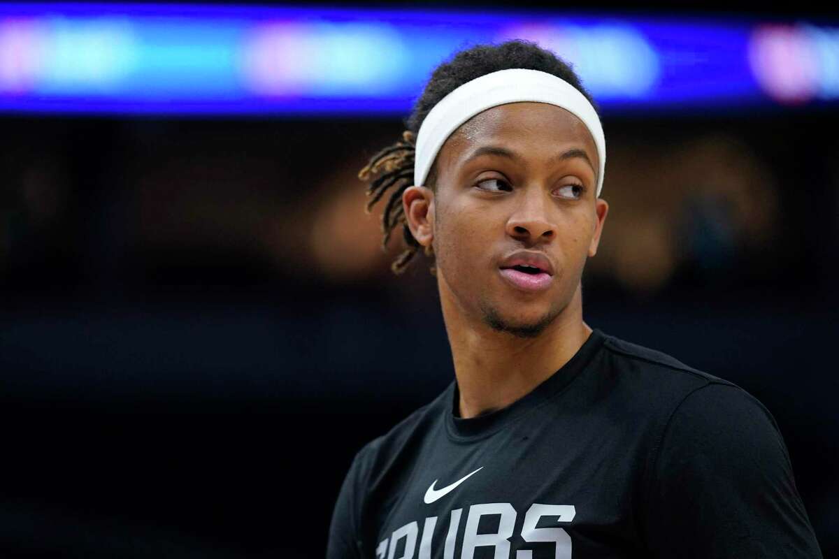 San Antonio Spurs guard Romeo Langford stands on the court before an NBA basketball game against the Minnesota Timberwolves, Monday, Oct. 24, 2022, in Minneapolis. (AP Photo/Abbie Parr)