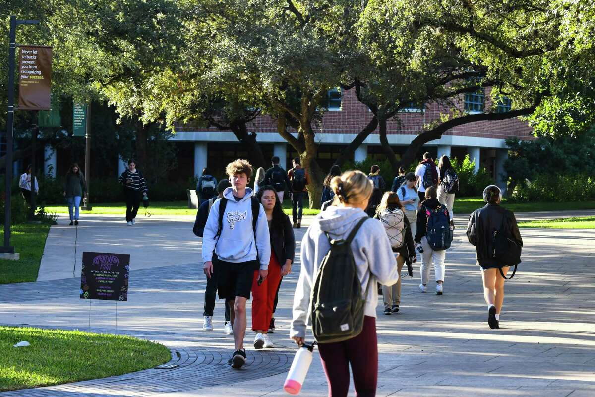 Trinity University students walk in between classes on Wednesday.