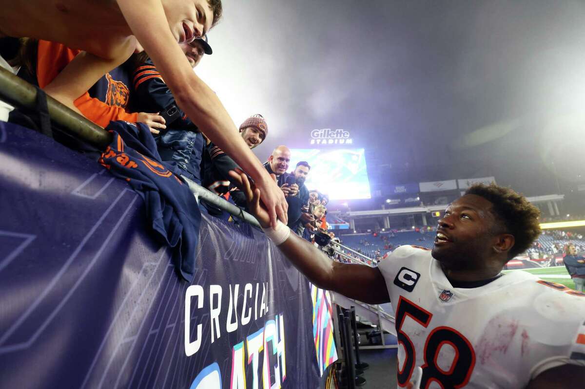 Bears linebacker Roquan Smith greets fans after beating the New England Patriots 33-14 on Oct. 24.