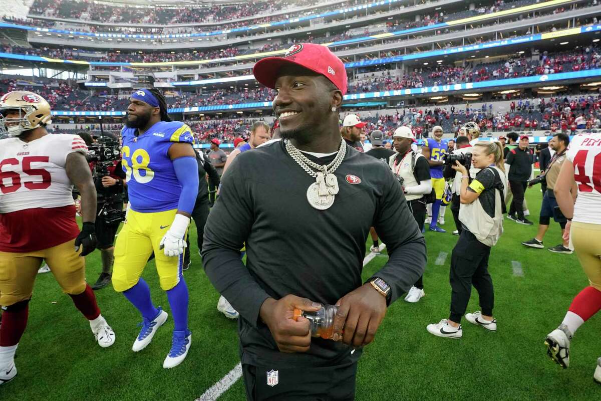San Francisco 49ers' Deebo Samuel walks on the field after the 49ers defeated the Los Angeles Rams 31-14 in an NFL football game Sunday, Oct. 30, 2022, in Inglewood, Calif. (AP Photo/Gregory Bull)