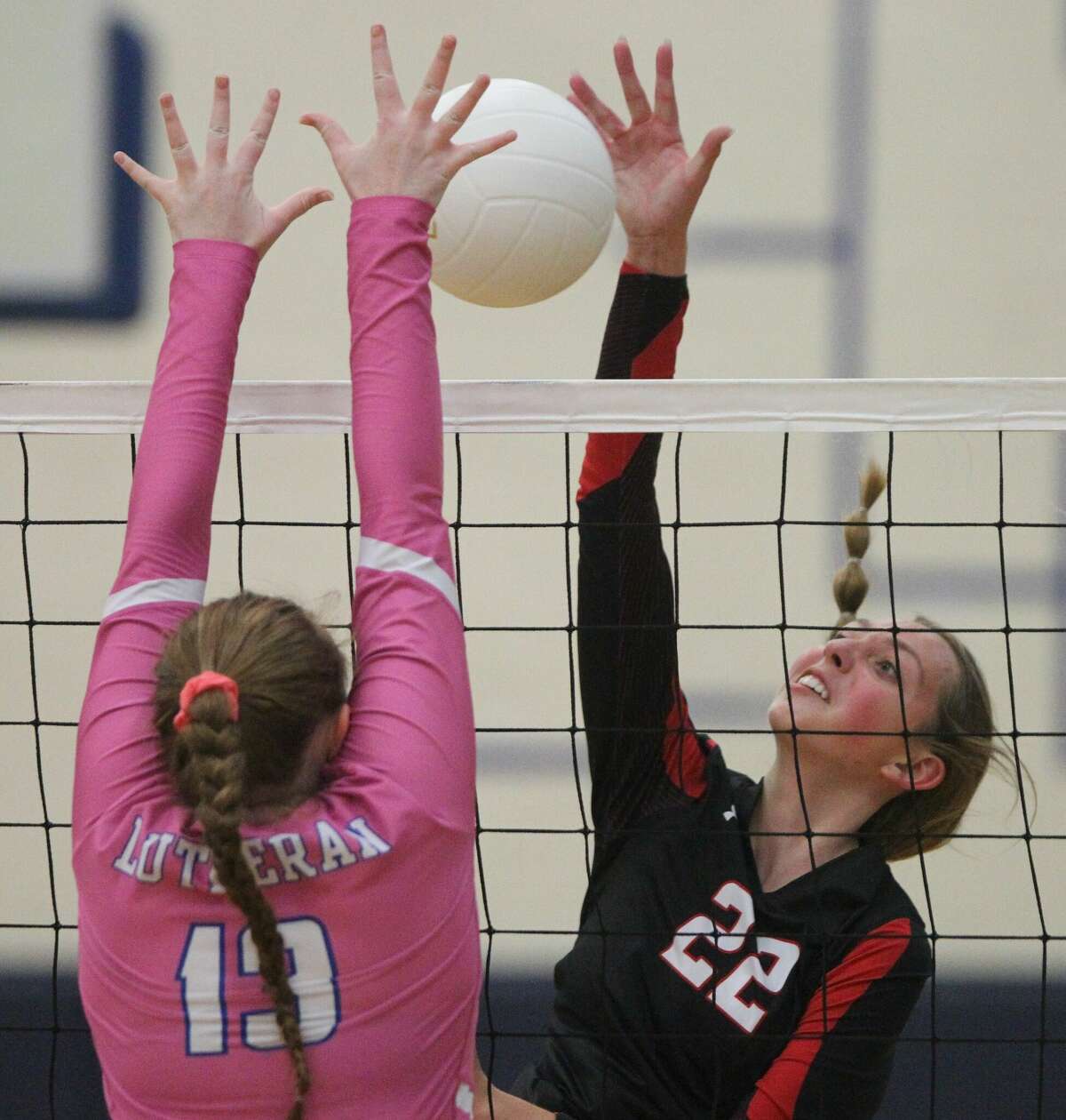 Calhoun's Abby Johnes spikes the ball against Springfield Lutheran in the semifinals of the North Greene Sectional Monday night in White Hall. Lutheran beat Calhoun 25-23, 25-23. The Crusaders advance to the sectional championship game, where they will face Mendon Unity, a 25-19, 25-19 winner over Raymond Lincolnwood in Monday's second semifinal match.