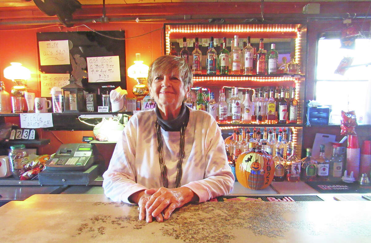 Sue Johnson at Sue’s Corner, the Granite City bar that she owns with her daughter, Terri Johnson-Bast. Fourteen years ago, the bar started a “Kids at Christmas” fundraiser that has since raised $72,000.