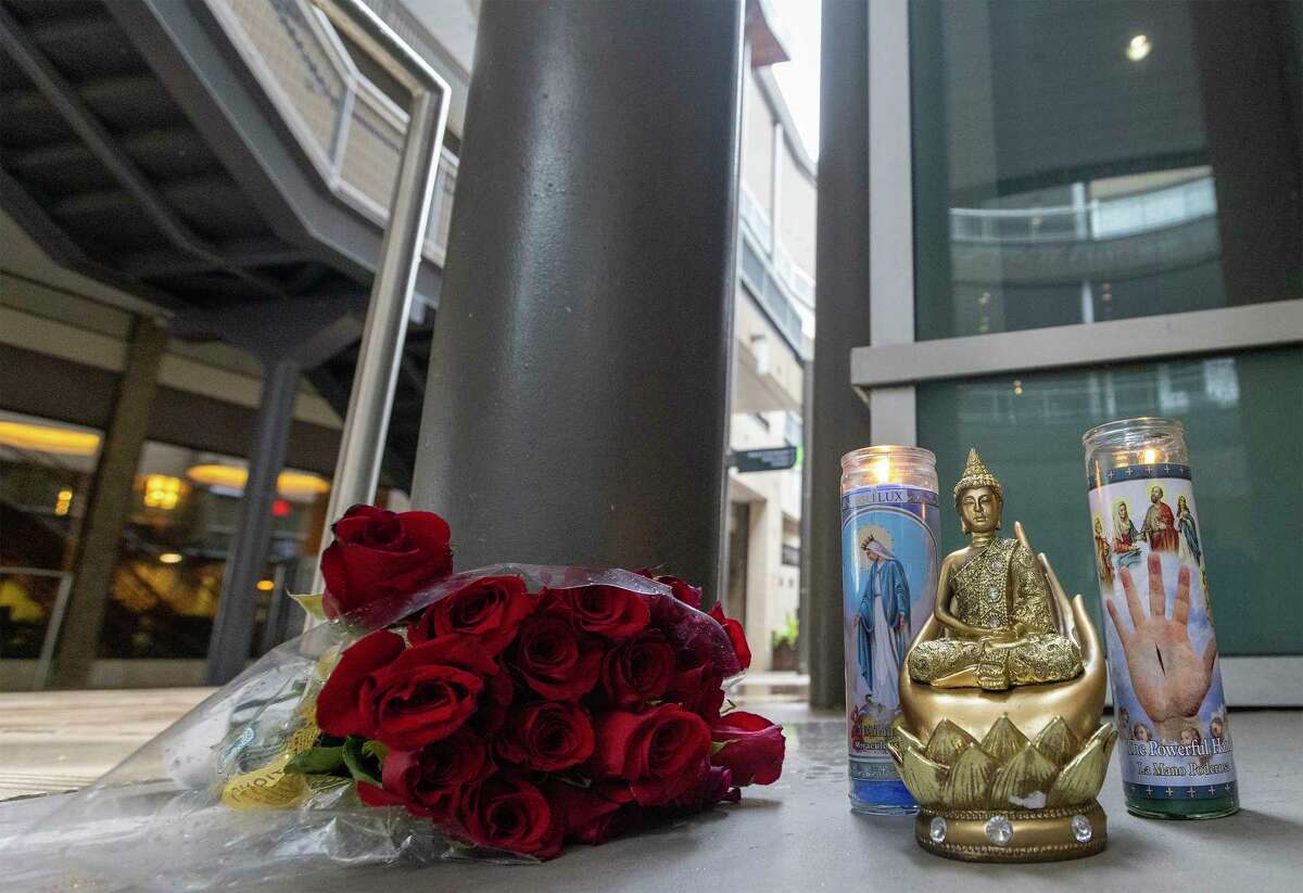 Marisa Brown left candles and flowers for rapper Takeoff that was shot and killed at a private party at Houston bowling alley in Houston. Rapper Takeoff, a member of Atlanta-based rap group Migos, was fatally shot at a Houston bowling alley and pool hall early Tuesday, a group representative told the Associated Press. The 28-year-old was one of three people shot during a private event.