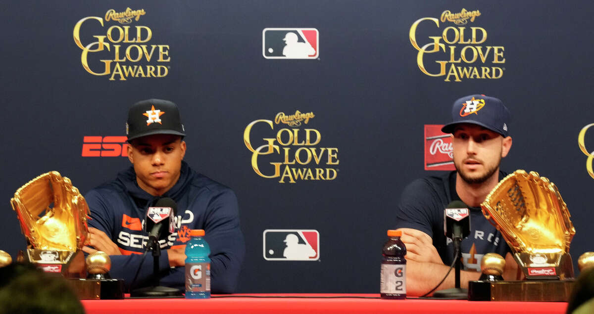 Astros teammates Jeremy Peña (left) and Kyle Tucker were honored for their defensive excellence Tuesday with the first Gold Glove awards of their careers.