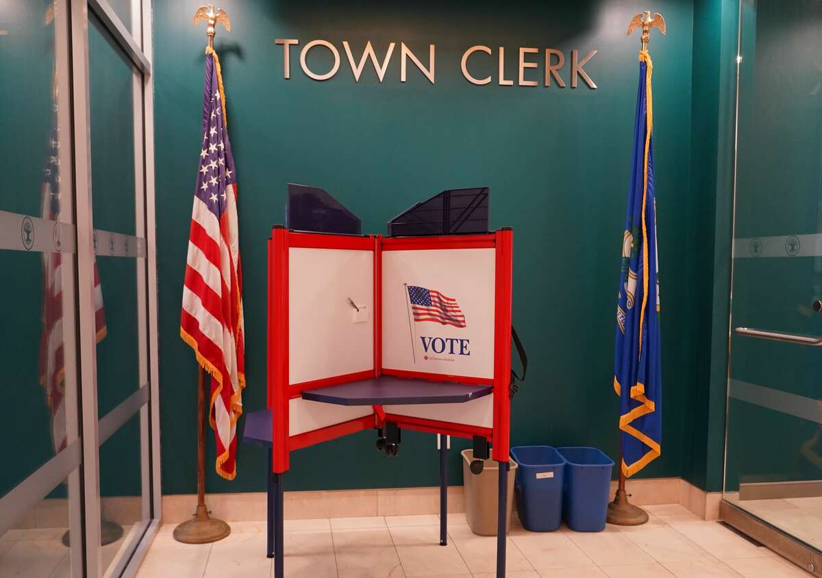 Outside of the New Canaan Town Clerk's office is a polling booth to remind people the election is Nov. 8, 2022.
