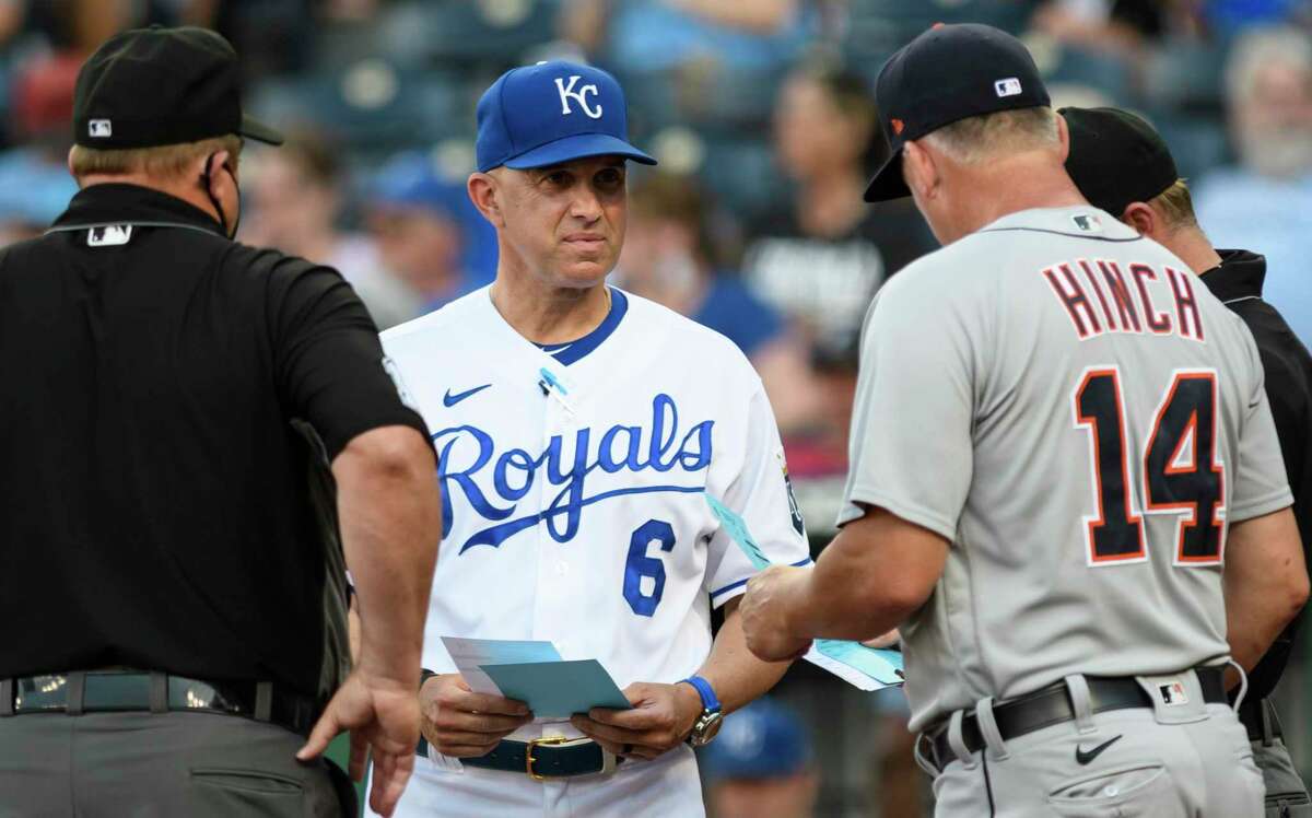 FILE - Kansas City Royals bench coach Pedro Grifol meets with Detroit Tigers manager A.J. Hinch and the umpires before the start of their baseball game in Kansas City, Mo., Monday, June 14, 2021. The Chicago White Sox hired Kansas City Royals bench coach Pedro Grifol to replace Hall of Famer Tony La Russa as their manager, a person familiar with the situation said on Tuesday, Nov. 1, 2022. The person spoke on the condition of anonymity because the team has not announced the hiring.(AP Photo/Reed Hoffmann, File)