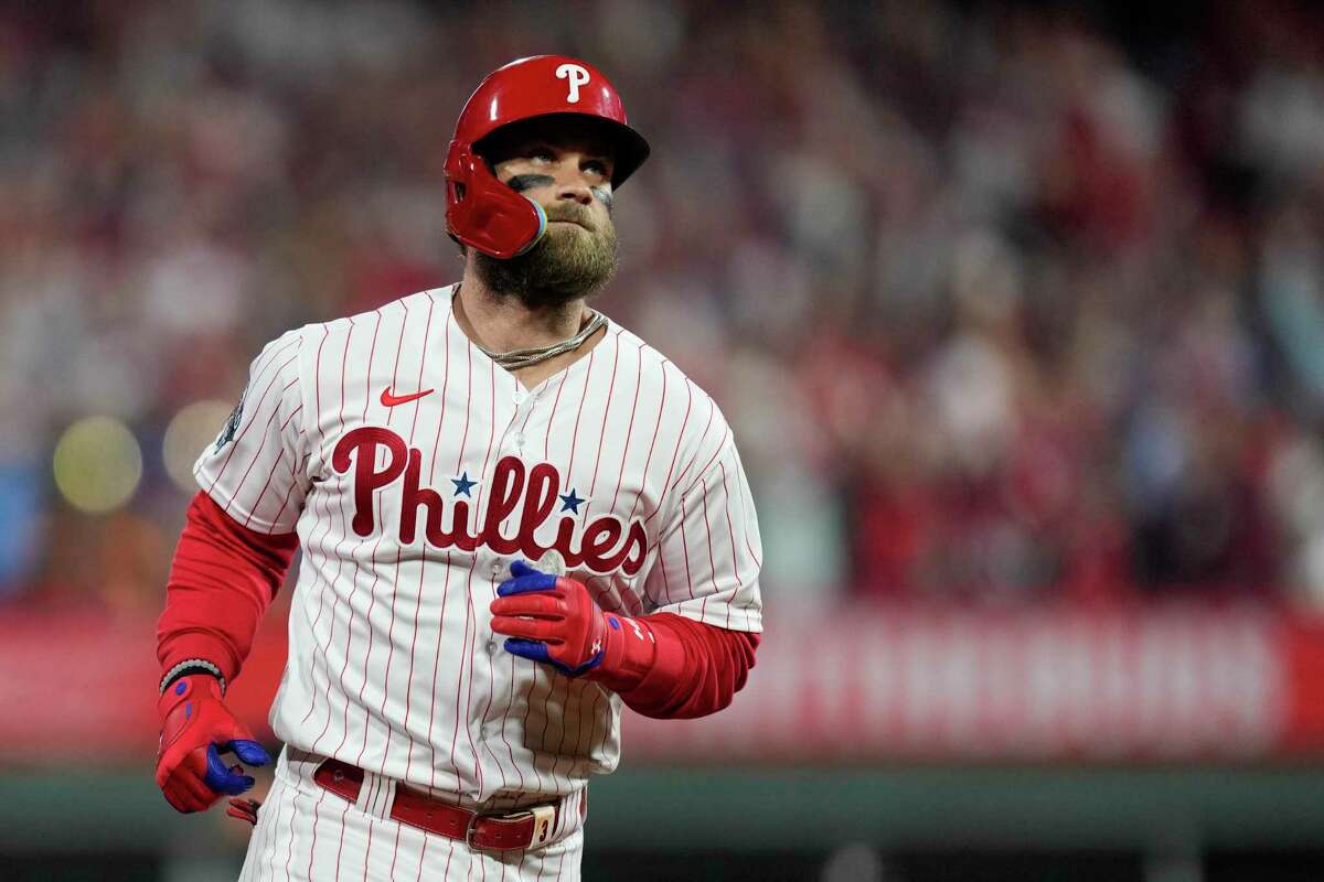 Philadelphia Phillies designated hitter Bryce Harper (3) hits a 2-run home run over Houston Astros starting pitcher Lance McCullers Jr. to take a 2-0 lead in the first inning during Game 3 of the World Series at Citizens Bank Park on Tuesday, Nov. 1, 2022, in Philadelphia.