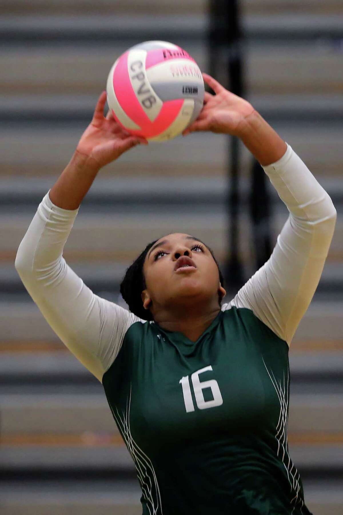 Spring's Kori Sessions sets the ball against College Park during their Region II-6A bi-district volleyball match at College Park High School Tuesday, Nov. 1, 2022 in The Woodlands, TX.