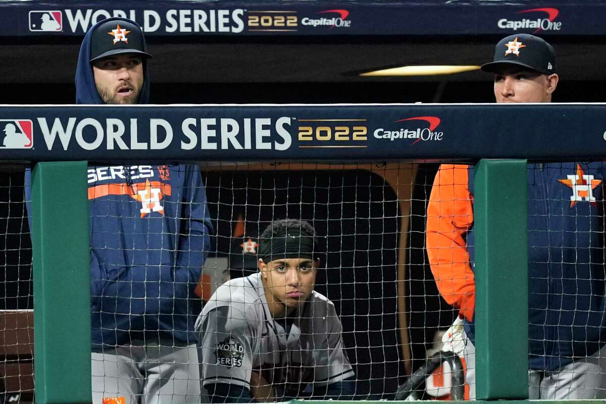 Houston Astros shortstop Jeremy Peña, center, sits in the dugout in the ninth inning during Game 3 of the World Series at Citizens Bank Park on Tuesday, Nov. 1, 2022, in Philadelphia.