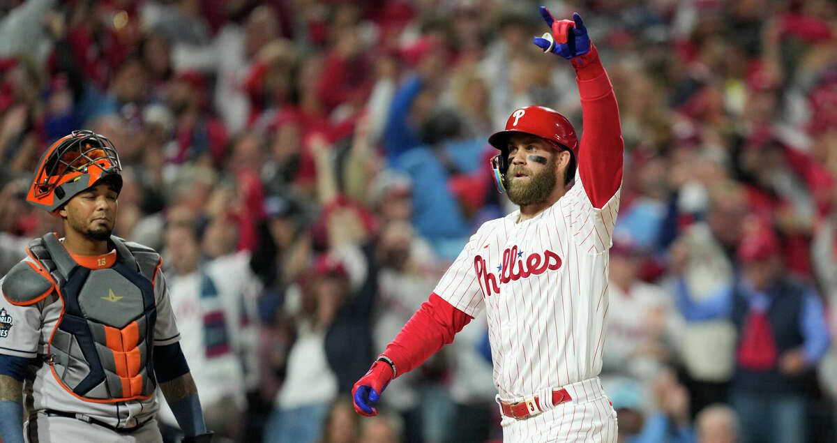 Philadelphia Phillies designated hitter Bryce Harper (3) reacts after hitting a 2-run home run off Houston Astros starting pitcher Lance McCullers Jr. in the first inning during Game 3 of the World Series at Citizens Bank Park on Tuesday, Nov. 1, 2022, in Philadelphia.