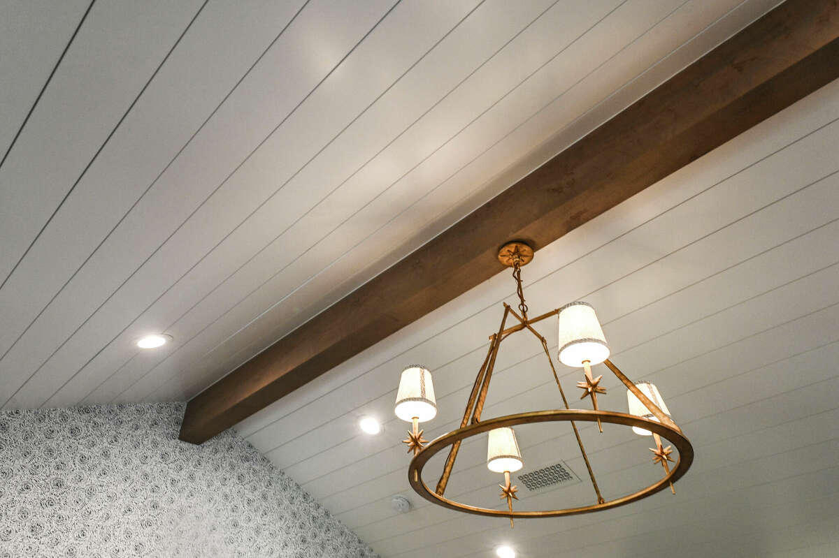The ceiling in the owner's bedroom was vaulted to echo the one in the living room.