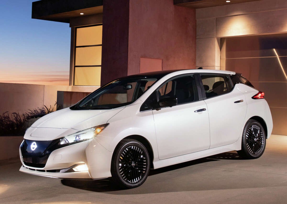 The 2023 Nissan Leaf SV Plus compact electric hatchback is shown here with the Pearl White TriCoat exterior paint with black roof. The two-tone paint scheme is a $695 upgrade.