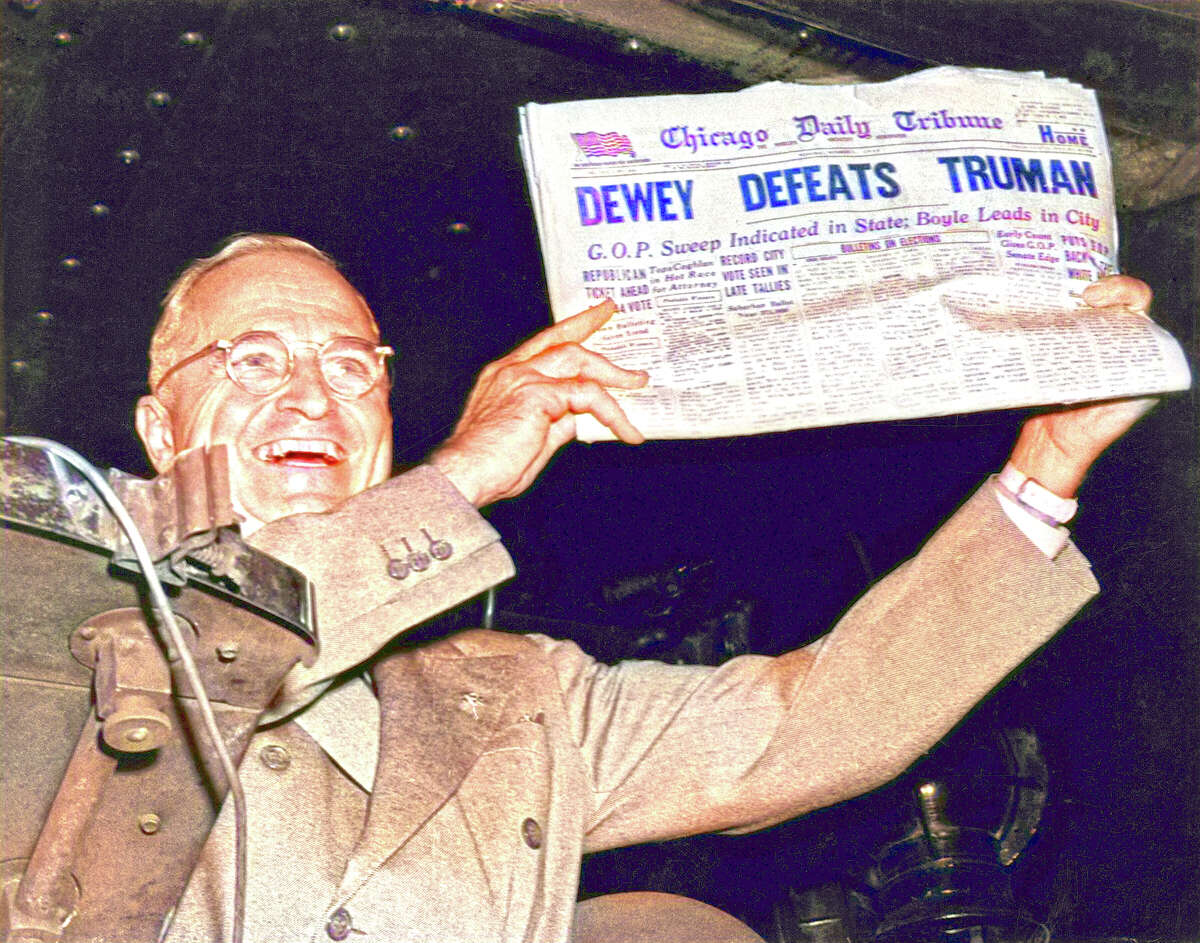President Harry Truman holds up a copy of the Chicago Daily Tribune declaring his defeat to Thomas Dewey in the presidential election in 1948.