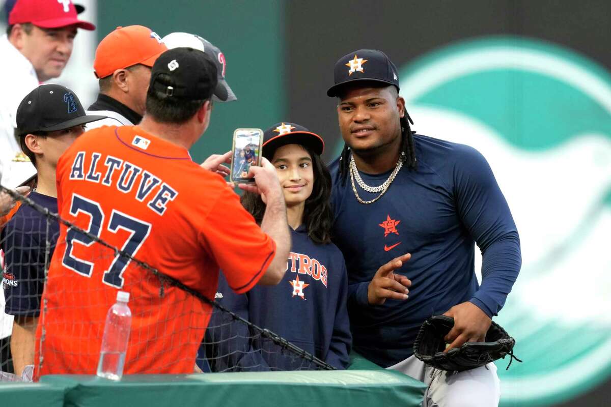 A fan looks for a jersey before Game 2 of baseball's World Series