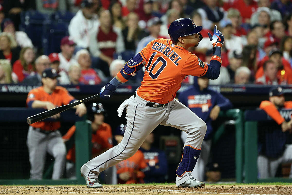 PHILADELPHIA, PENNSYLVANIA - NOVEMBER 02: Yuli Gurriel #10 of the Houston Astros hits a single against the Philadelphia Phillies during the fourth inning in Game Four of the 2022 World Series at Citizens Bank Park on November 02, 2022 in Philadelphia, Pennsylvania. (Photo by Tim Nwachukwu/Getty Images)
