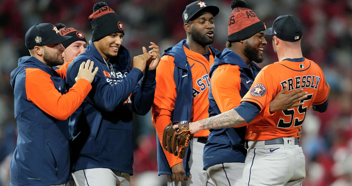 Houston Astros starting pitcher Cristian Javier (53) celebrates with relief pitcher Ryan Pressly (55) after the final out of Game 4 to complete the first combine no-hitter in the World Series at Citizens Bank Park on Wednesday, Nov. 2, 2022, in Philadelphia.