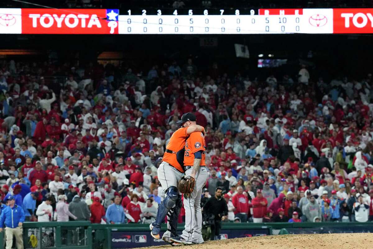 Houston Astros relief pitcher Ryan Pressly (55) celebrates with catcher Christian Vazquez (9) after the final out of Game 4 to complete the first combine no-hitter in the World Series at Citizens Bank Park on Wednesday, Nov. 2, 2022, in Philadelphia.