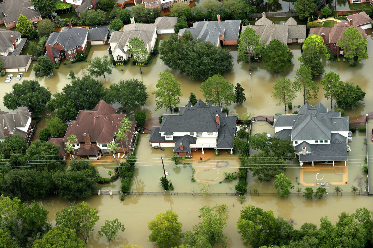 Floodwaters from the Addicks Reservoir inundate a neighborhood off N. Eldridge Parkway in the aftermath of Tropical Storm Harvey on Wednesday, Aug. 30, 2017, in Houston. ( Brett Coomer / Houston Chronicle )