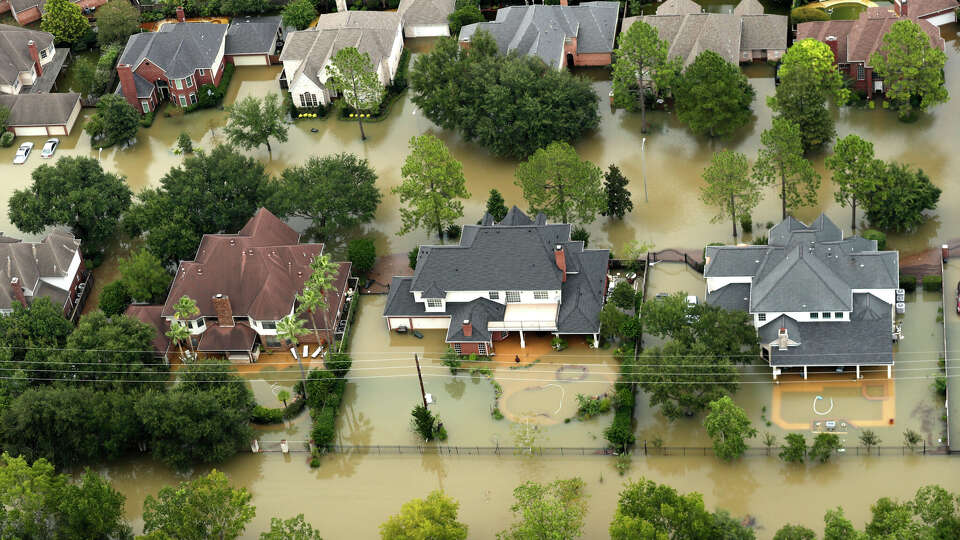 Floodwaters from the Addicks Reservoir inundate a neighborhood off N. Eldridge Parkway in the aftermath of Tropical Storm Harvey on Wednesday, Aug. 30, 2017, in Houston. ( Brett Coomer / Houston Chronicle )