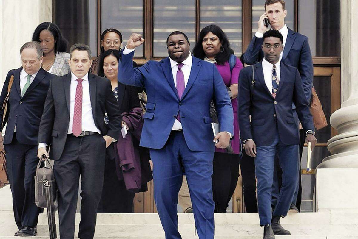 David Hinojosa, front and second from left, leaving the U.S. Supreme Court on Monday, Oct. 31, 2022, after defending affirmative action in college admissions, and a case that faces a court that already has reversed precedent.