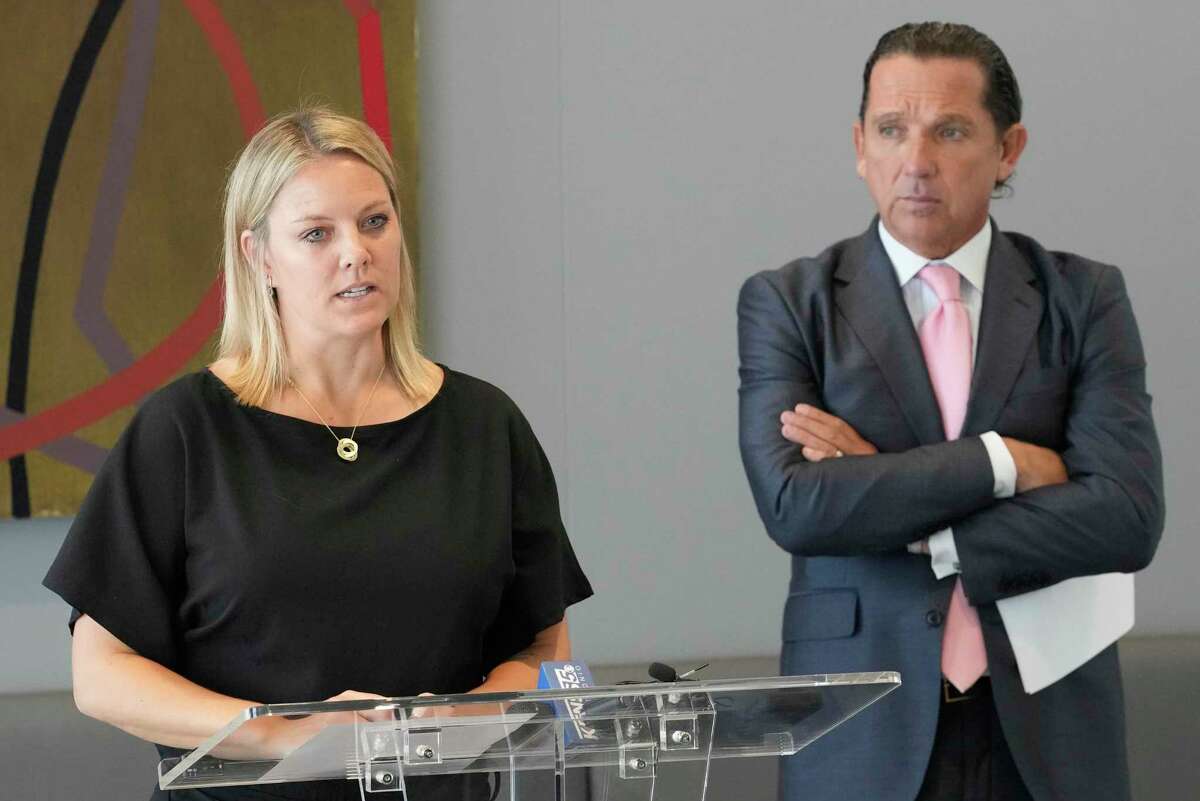 Dr. Hillary Cauthen, a former San Antonio Spurs consulting psychologist, left, with her attorney Tony Buzbee speaks during a press conference Thursday, Nov. 3, 2022, in Houston. Cauthen has accused former Spurs NBA player Josh Primo of exposing himself to her.