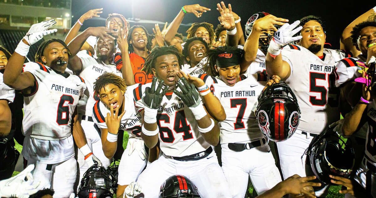 Port Arthur Memorial players pose for pictures after a high school football game, District 8-5A Division I game between Kingwood Park vs. Port Arthur Memorial at Turner Stadium in Humble, TX, November 3, 2022. Port Arthur Memorial defeated Kingwood Park 34 to 22.
