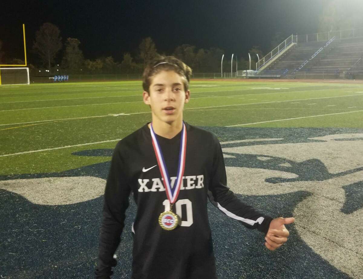Mario Milardo scored both goals for the Xavier soccer team, which defeated Fairfield Prep 2-1 in overtime to help the Falcons win the SCCchampionship on Nov. 3, 2022.
