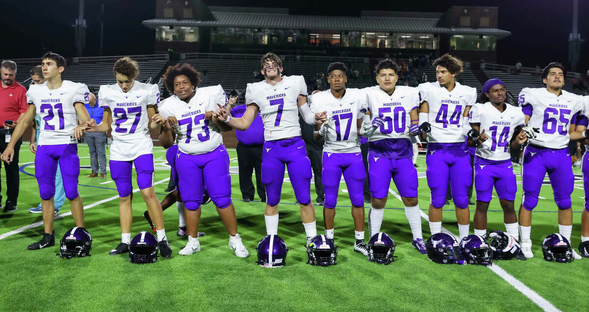 Morton Ranch players celebrate a 33-36 win in their District 19-6A high school football game between the Morton Ranch Mavericks and the Jordan Warriors at Rhodes Stadium in Katy, TX on Thursday, November 3, 2022.