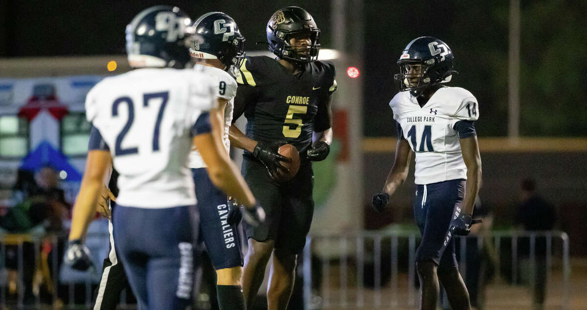 Conroe receiver Cameron Thomas (5) catches a pass from Javarious Hatchett in the back of the end zone for a touchdown in a high school football game between College Park and Conroe Thursday, Nov 3, 2022, in Conroe.