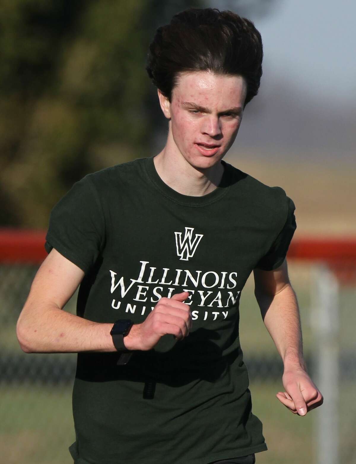 South County's Robby Biesenthal works out at the New Berlin track in preparation for this Saturday's IHSA Cross Country State Final Meet.