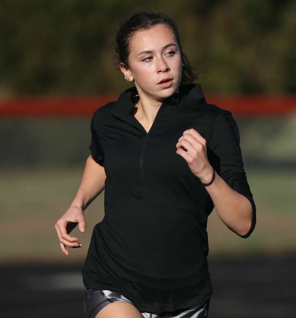 South County's Madigan Burger works out at the New Berlin track Thursday in preparation for Saturday's IHSA Cross Country State Final Meet.