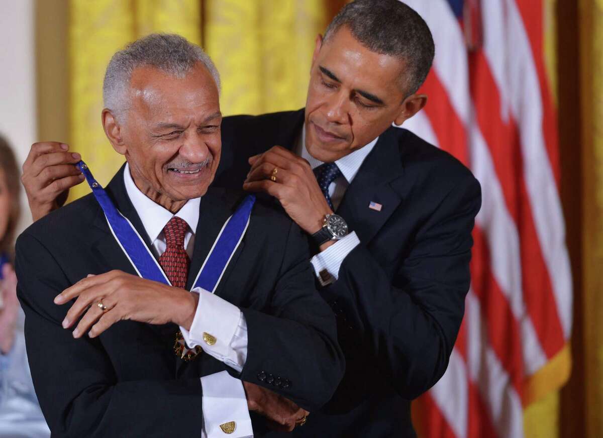 President Barack Obama presents the Presidential Medal of Freedom to minister/author, C. T. Vivian in 2013. Vivian was a civil rights icon who would sacrifice anything for preserving and expanding democracy.