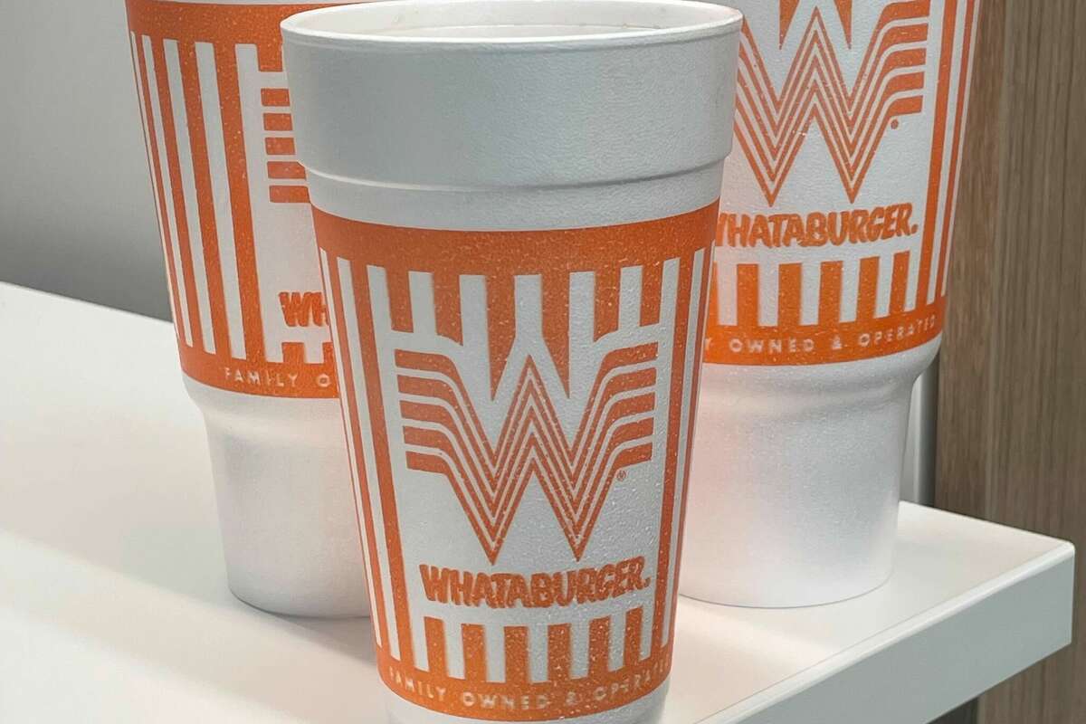 Whataburger cups in all sizes bear the phrase "family owned & operated" despite 2019 sale. 