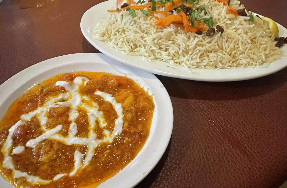 Afghan Village's qabuli palau comes with a tomato-based sauce.