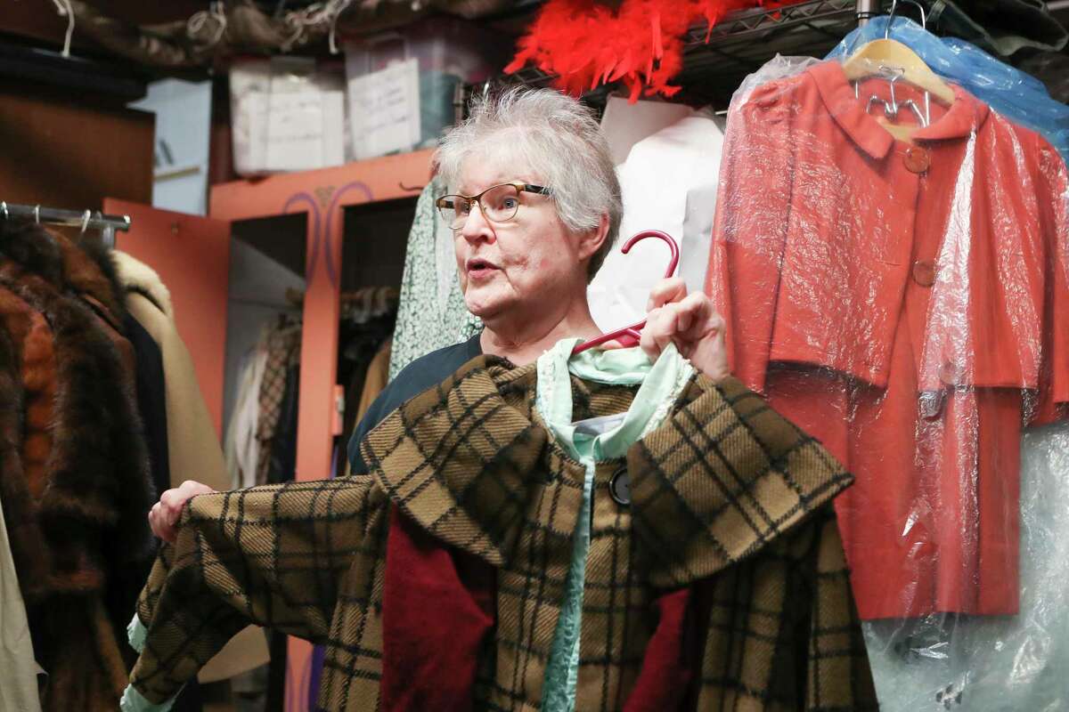 Costume designer Sue Hayes talks about keeping historic costumes, including one used in the 1980s, at the Owen Theatre on Thursday, Nov. 3, 2022, in Conroe.