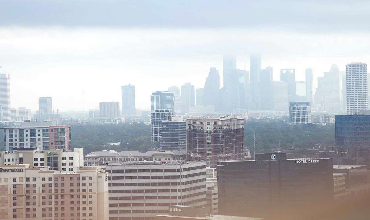 A foggy Houston skyline as seen from the Galleria on Friday, Nov. 4, 2022 in Houston.