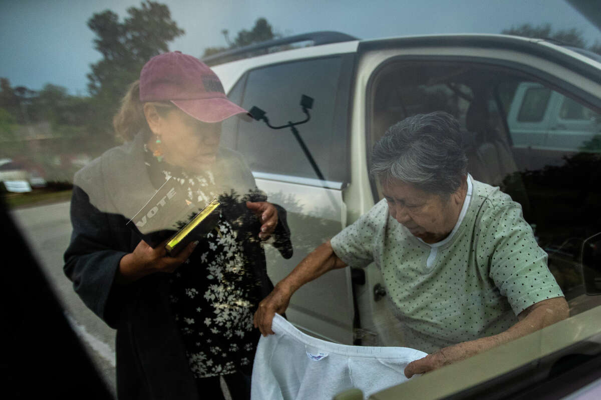 Consuelo RamÃ­rez, 57, and Carmen HernÃ¡ndez, 84, arrive together to a polling site so HernÃ¡ndez can cast her vote during early voting, Thursday, Nov. 3, 2022, in Houston.