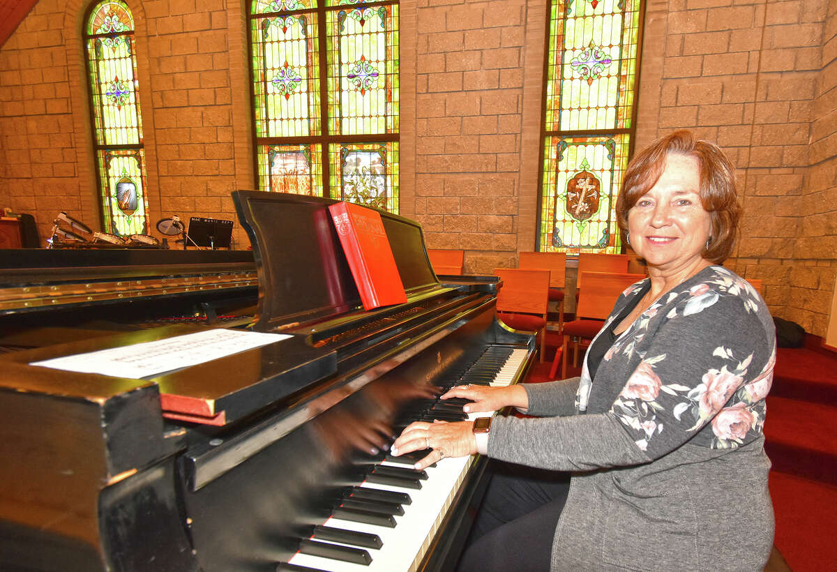 Terri Benz sits at the piano at Centenary United Methodist Church, where she is music director.